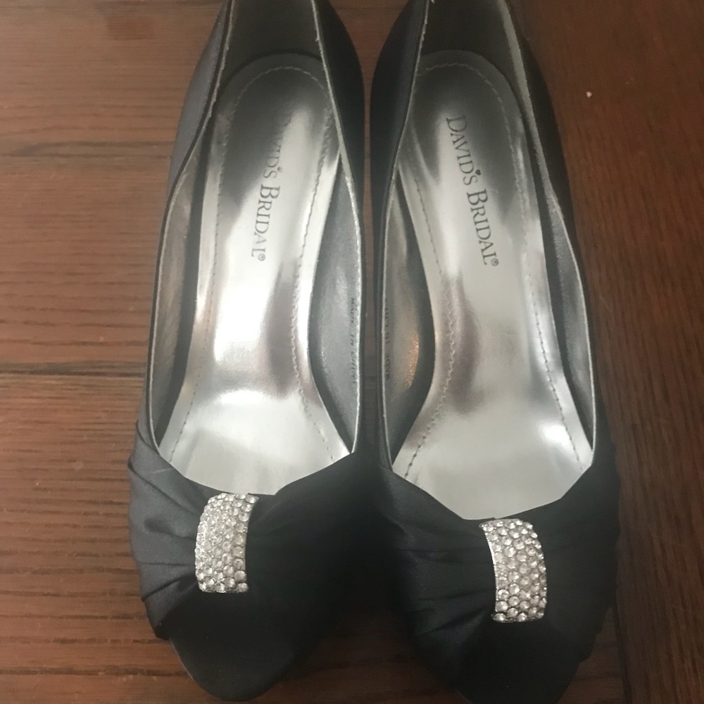 Black satin high heel shoes